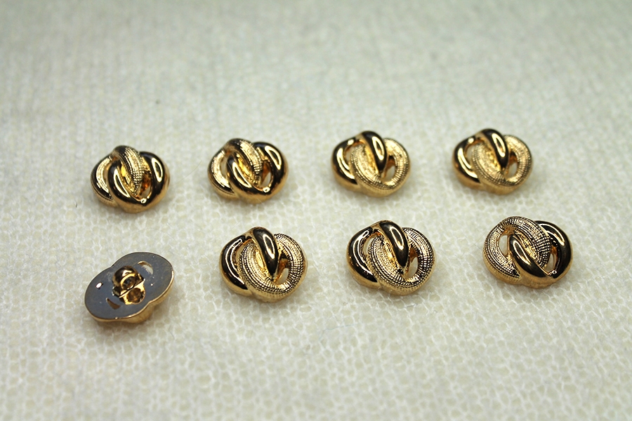 Gold Plastic Decorative "Knot" Button - Oval